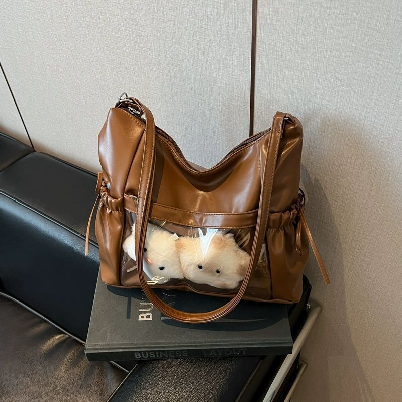 Brown ita hobo bag with bows