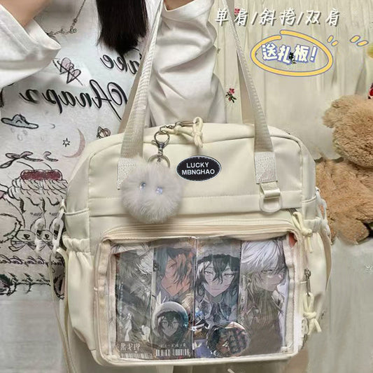Cream ita tote backpack with clear window pin display