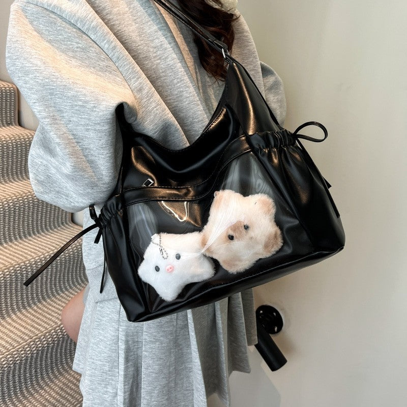 Black ita hobo bag with bow drawstrings