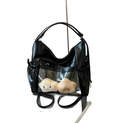 Black ita hobo bag with clear plush window, front view
