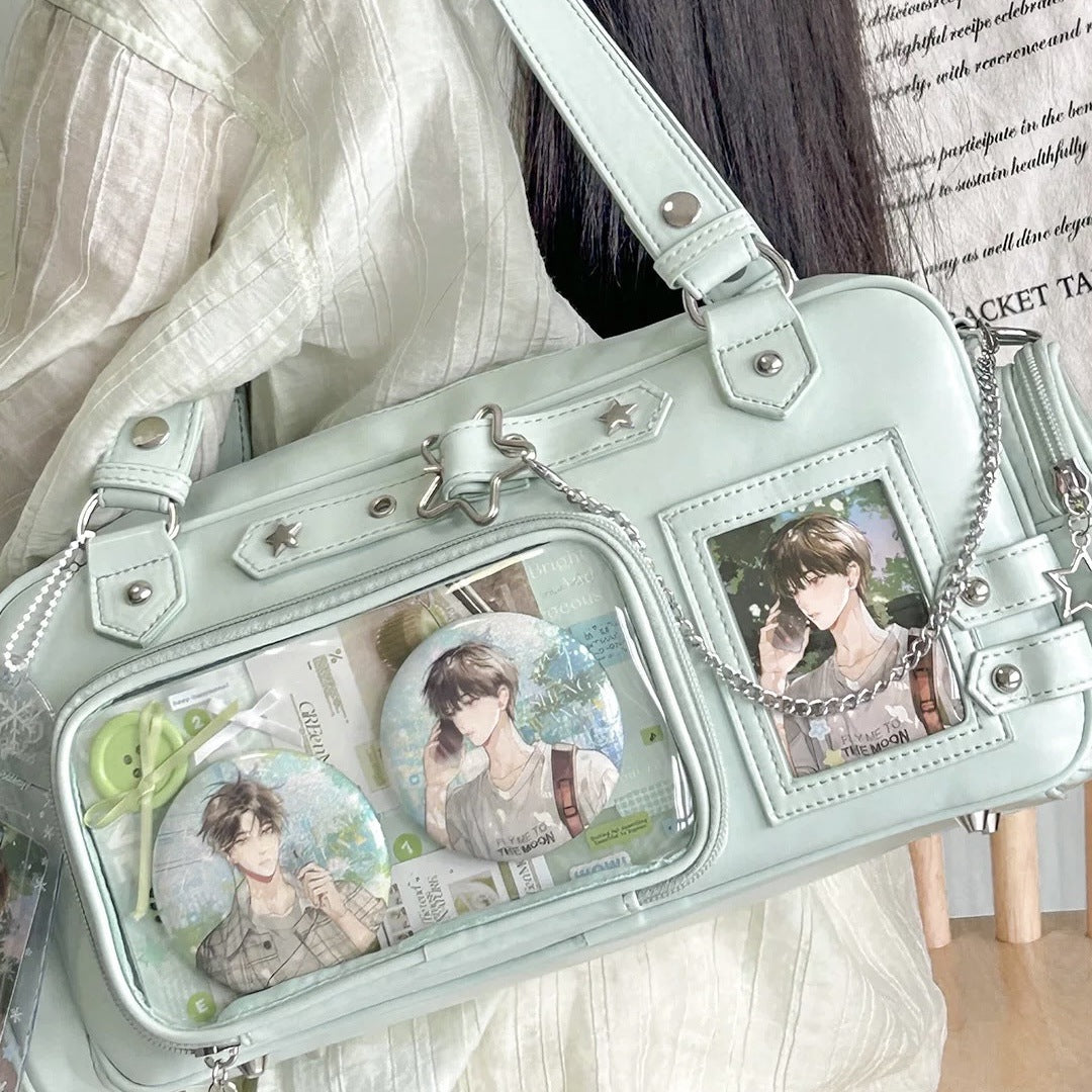 Green ita Boston bag with badges and photocards