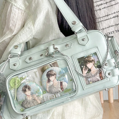 Green ita Boston bag with badges and photocards