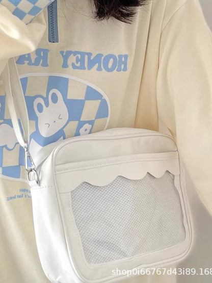 White kawaii ita crossbody bag with scalloped clear window