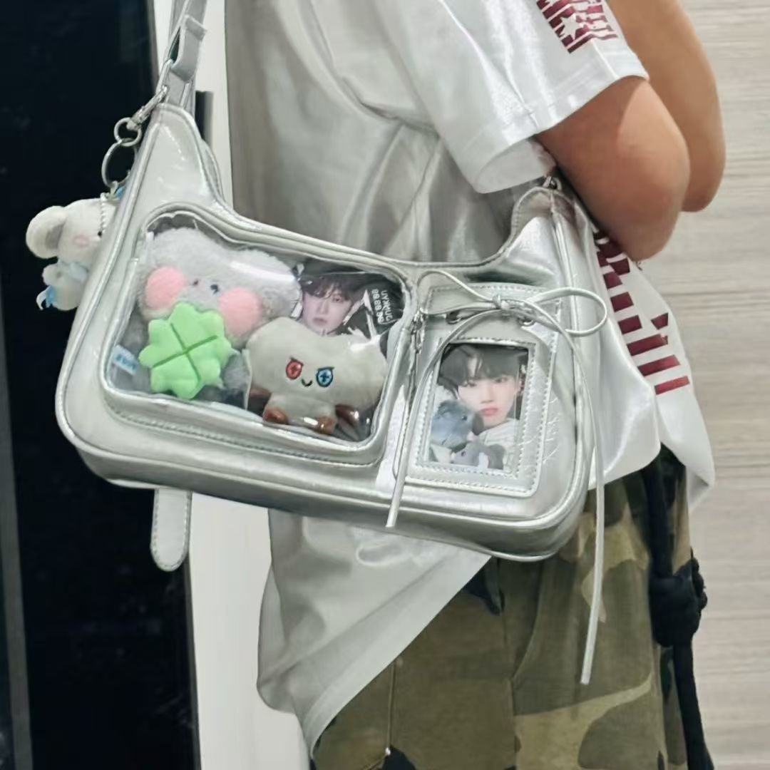 Silver ita photocard underarm bag with plushies in the clear pockets