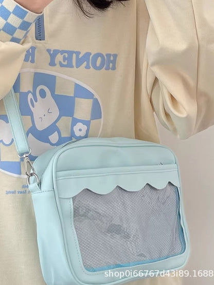 Blue kawaii ita crossbody bag with scalloped clear window