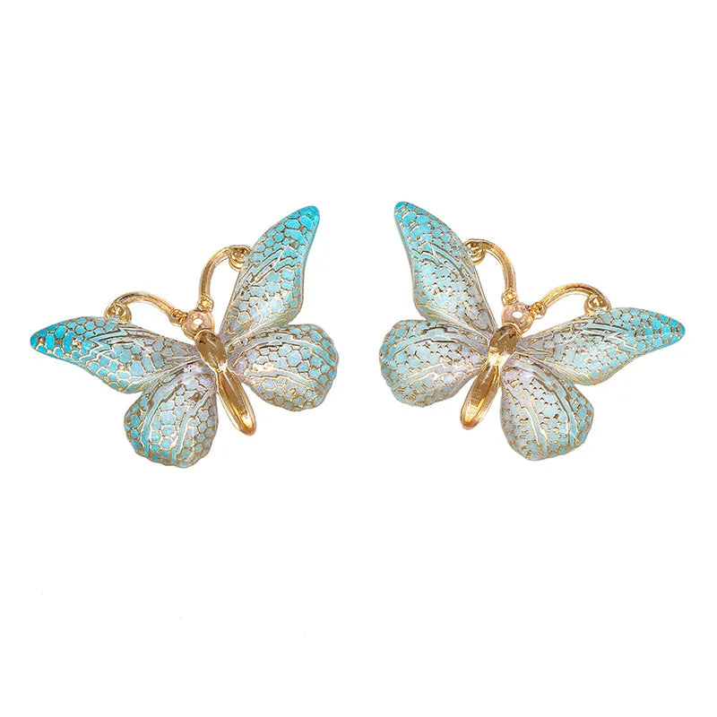 Glitter butterfly charms – Blue
